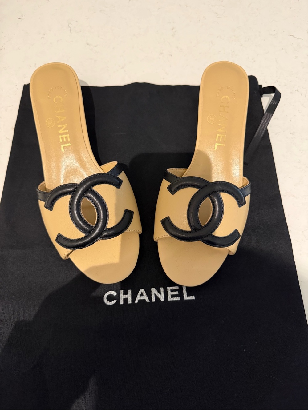CHANEL Tan and Black Leather CC Slide Mules